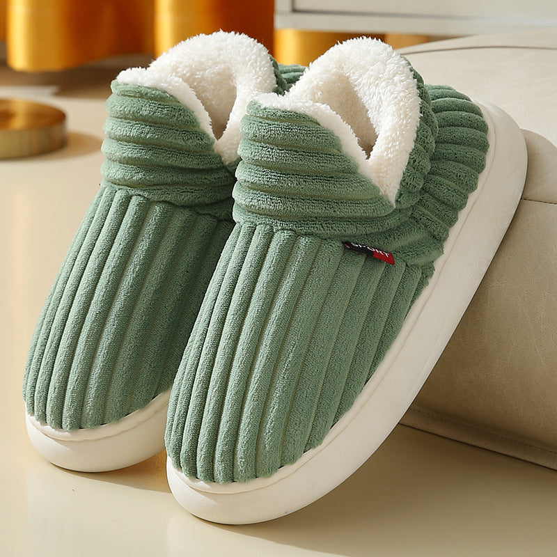 Cozy fleece-lined green cotton slippers with anti-slip soles, perfect for winter warmth and comfort.