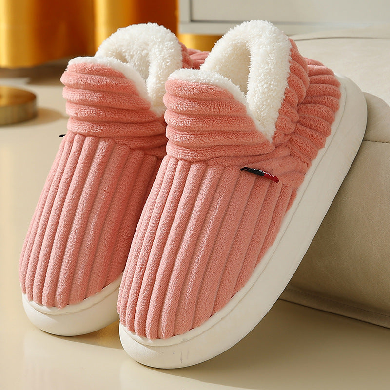 Pink fleece-lined cotton slippers with anti-slip soles for men and women, ideal for winter warmth and indoor comfort.