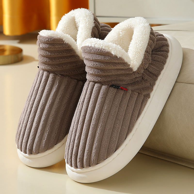 Cozy brown fleece-lined winter slippers with anti-slip soles for indoor warmth and comfort.