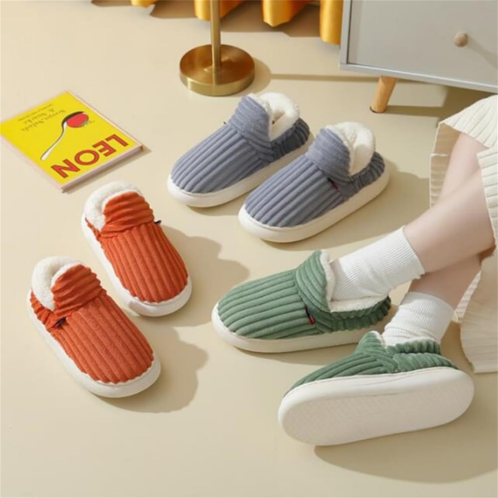 Cozy fleece-lined cotton slippers in orange, green, and gray, perfect for winter warmth and comfort with anti-slip soles.